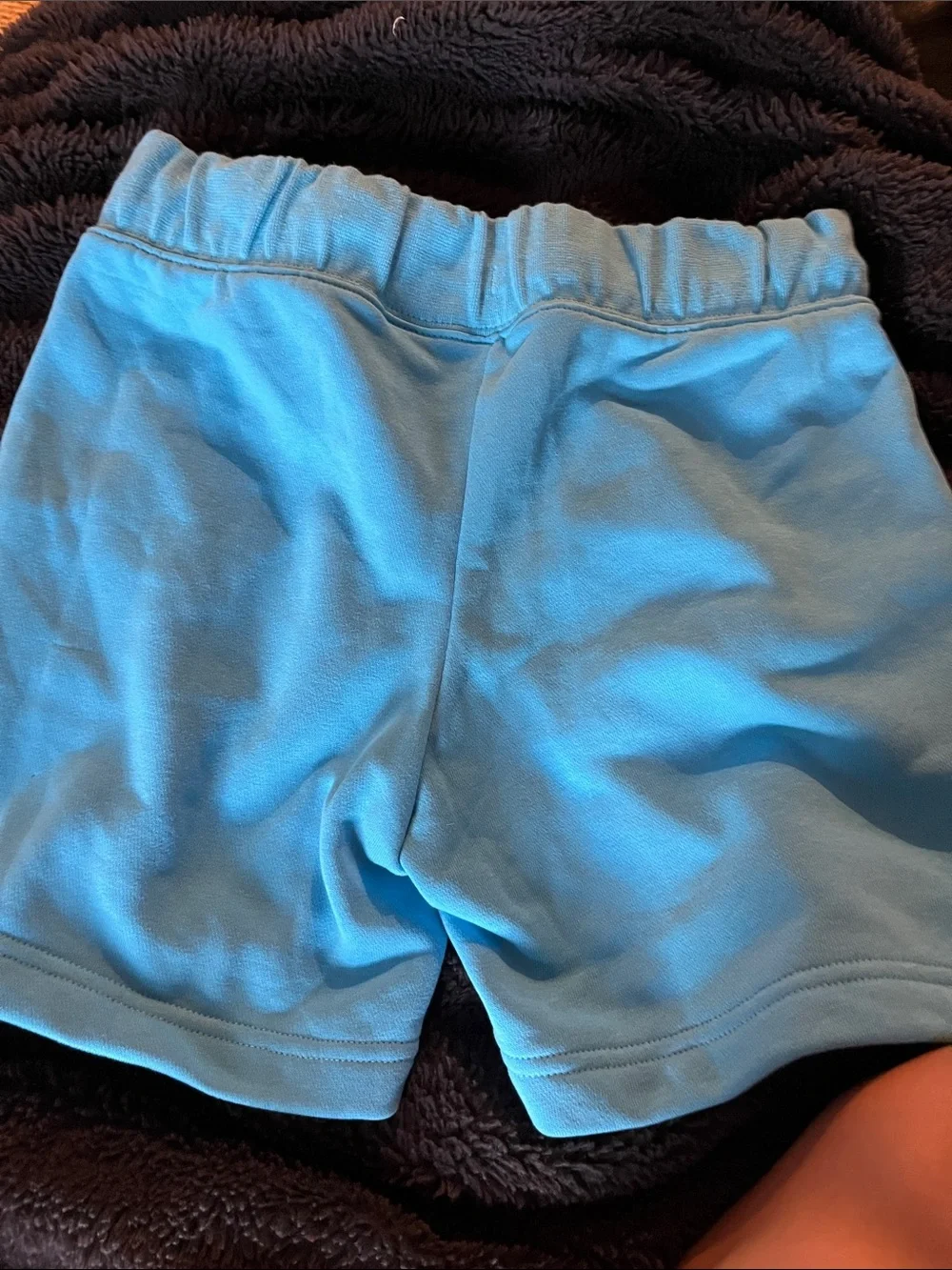 Nike Light Blue Shorts with Pink Swoosh Logo
